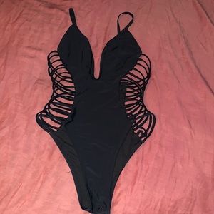 Black YIRA one-piece bathing suit. Size Large.